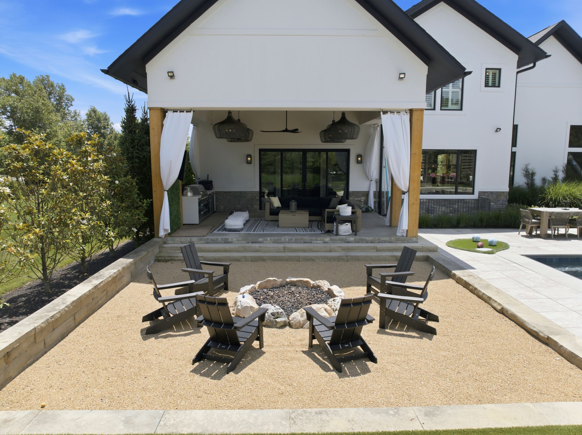 Fire pit circle and covered outdoor living room