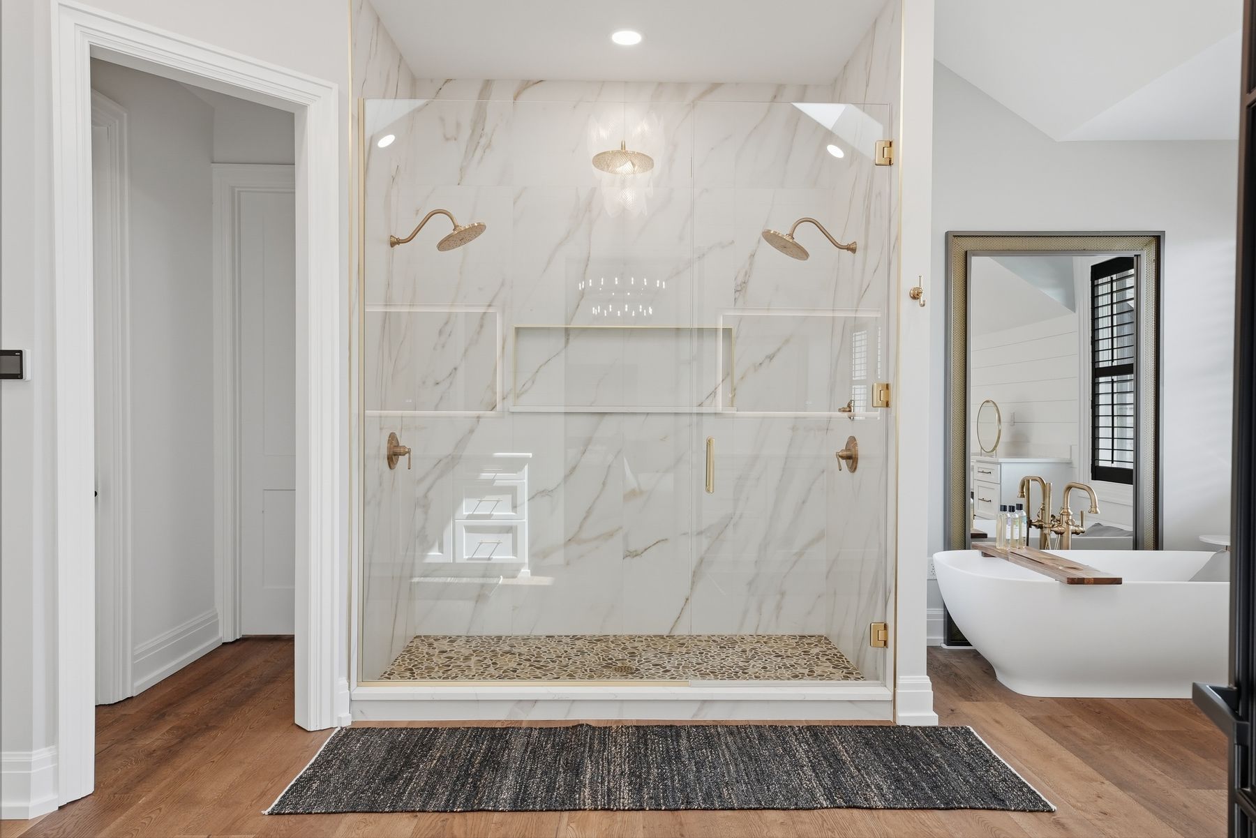 Marble primary bath with freestanding tub